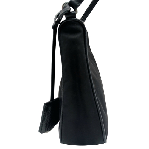 68 - A Prada Re-Edition Black Nylon Shoulder Bag. Black nylon exterior with silver-toned hardware, single... 