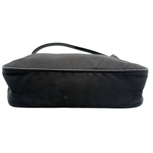 68 - A Prada Re-Edition Black Nylon Shoulder Bag. Black nylon exterior with silver-toned hardware, single... 