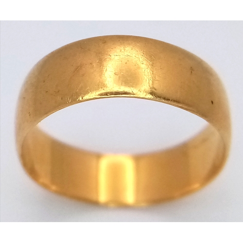 73 - A 22K Yellow Gold Band Ring. 6mm width. Size J. 2.75g.