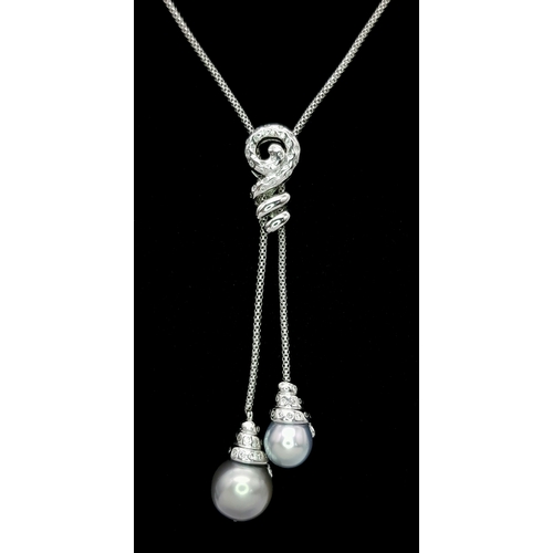 86 - An 18K White Gold, Pearl and Diamond Necklace. Fancy Venetian links with a diamond encrusted serpent... 