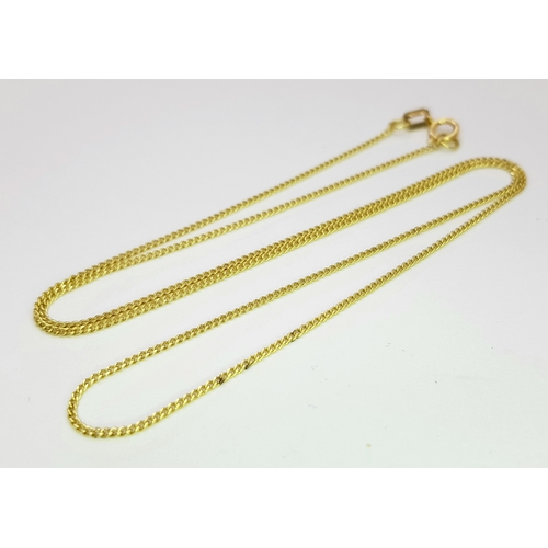 94 - An 18K Yellow Gold Petit Curb Link Chain/Necklace. 44cm. 2.3g.