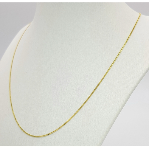 94 - An 18K Yellow Gold Petit Curb Link Chain/Necklace. 44cm. 2.3g.