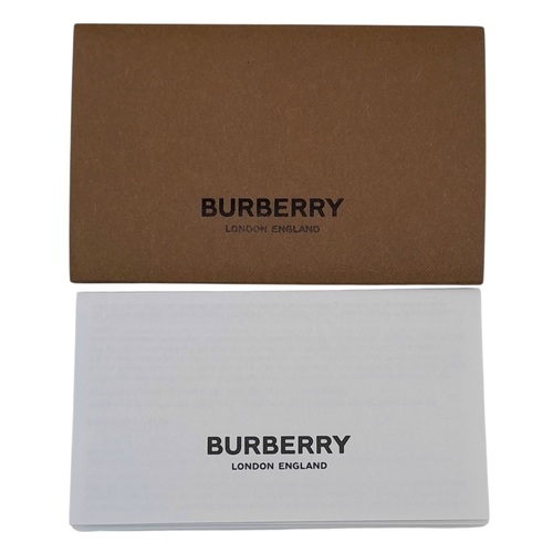 96 - A Burberry Black London Check Crossbody Bag. Black coated canvas exterior with silver-toned hardware... 