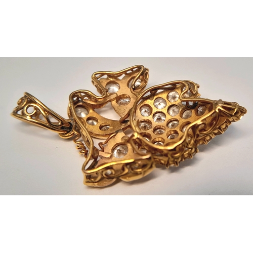104 - A 21K YELLOW GOLD, DIAMOND SET, BUNCH OF GRAPES PENDANT. 1.65 TCW APPROX, 5.3G. TAN 4009.