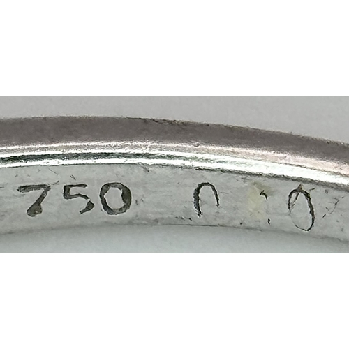 106 - An 18K White Gold Diamond Crossover Solitaire Ring. Size M. Brilliant round cut diamond c. 0.10ct. 1... 