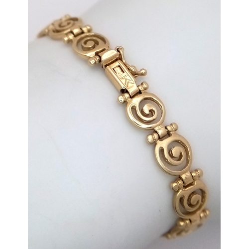 108 - A 14K GOLD GREEK SPIRAL DESIGNER BRACELET .    11.5gms    18cms
