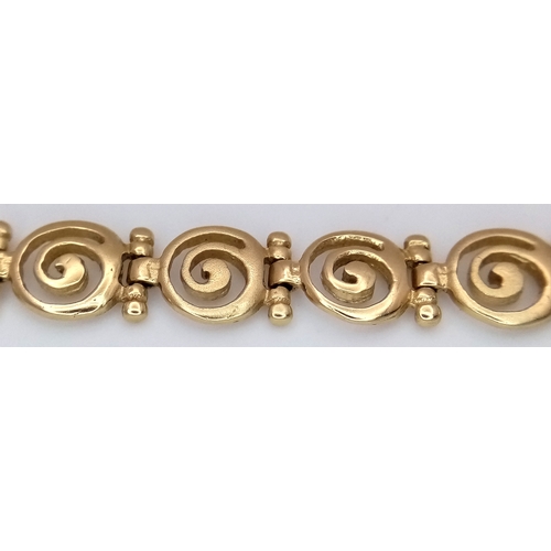 108 - A 14K GOLD GREEK SPIRAL DESIGNER BRACELET .    11.5gms    18cms