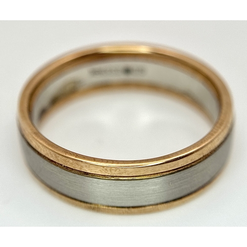 110 - A 950 Platinum and 9K Gold Band Ring. 7mm width. Size R. 6g. R-26760.