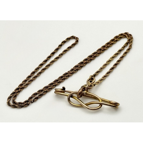 113 - A Vintage 9K Yellow Gold Rope Chain with a Crossover Safety Pin Pendant. chain - 40cm. 3.5cm pendant... 