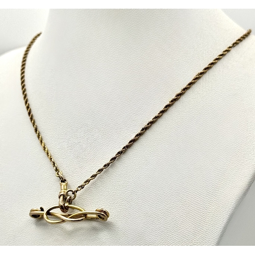 113 - A Vintage 9K Yellow Gold Rope Chain with a Crossover Safety Pin Pendant. chain - 40cm. 3.5cm pendant... 