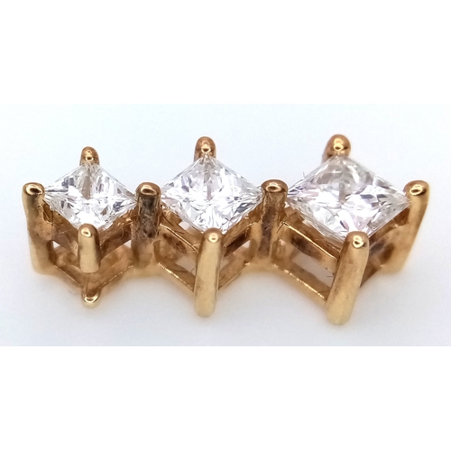 116 - A 14K Yellow Gold Graduating Diamond Pendant. c.1ctw of Princess cut diamonds. VS2/SI1 clarity. I-J ... 