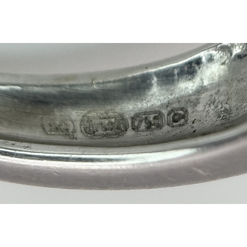 130 - An 18K White Gold Diamond Dress Ring. An array of pave round and princess cut diamonds c. 1.2ctw. Si... 