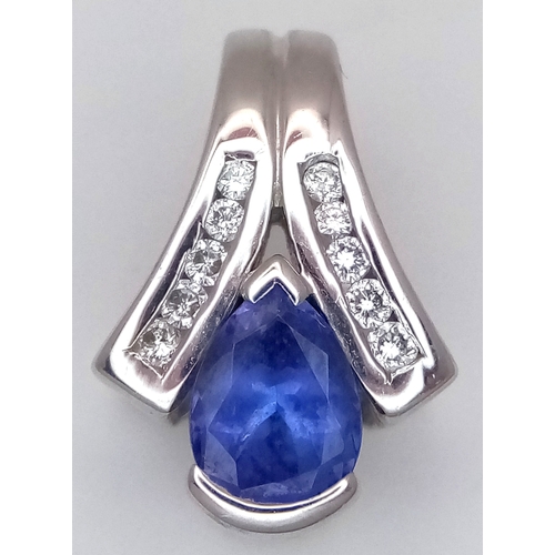 133 - Sophisticated 18 CARAT WHITE GOLD PENDANT. Having a PEAR CUT SAPPHIRE mounted to centre with DIAMOND... 