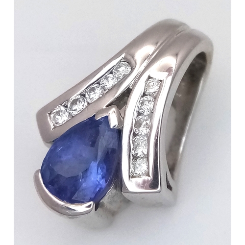 133 - Sophisticated 18 CARAT WHITE GOLD PENDANT. Having a PEAR CUT SAPPHIRE mounted to centre with DIAMOND... 