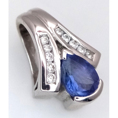 133 - Sophisticated 18 CARAT WHITE GOLD PENDANT. Having a PEAR CUT SAPPHIRE mounted to centre with DIAMOND... 