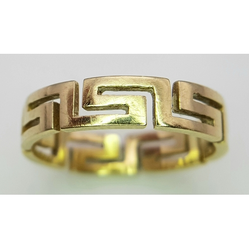 136 - A 14K GOLD RING WITH GREEK KEY CUTOUT DESIGN.    3gms.    size O