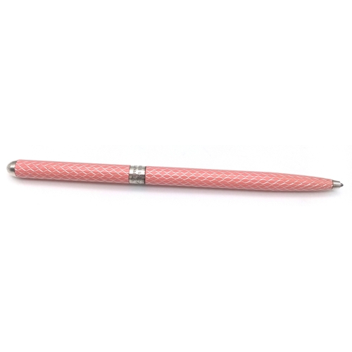 1179 - A Pretty Sterling Silver and Pink Tiffany & Co. Ballpoint Pen. Comes with original pouch and box.