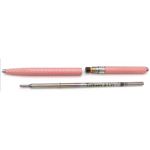 1179 - A Pretty Sterling Silver and Pink Tiffany & Co. Ballpoint Pen. Comes with original pouch and box.