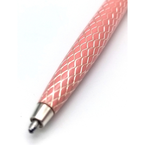 1179 - A Pretty Sterling Silver and Pink Tiffany & Co. Ballpoint Pen. Comes with original pouch and box.