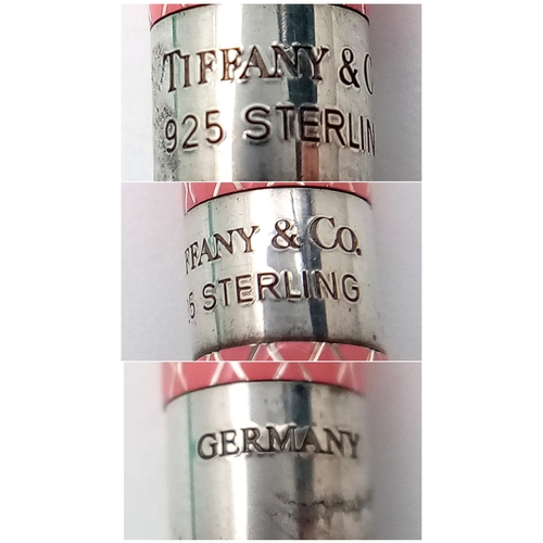 1179 - A Pretty Sterling Silver and Pink Tiffany & Co. Ballpoint Pen. Comes with original pouch and box.