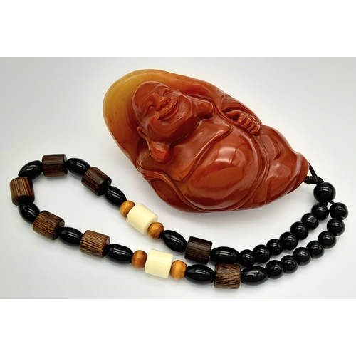 80 - A Shoushan stone pendant depicting the Buddha (Amitabha). Height 8 cm; Width 5 cm; Weight 146 g. The... 