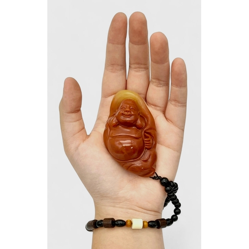 80 - A Shoushan stone pendant depicting the Buddha (Amitabha). Height 8 cm; Width 5 cm; Weight 146 g. The... 