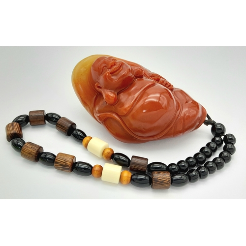 80 - A Shoushan stone pendant depicting the Buddha (Amitabha). Height 8 cm; Width 5 cm; Weight 146 g. The... 