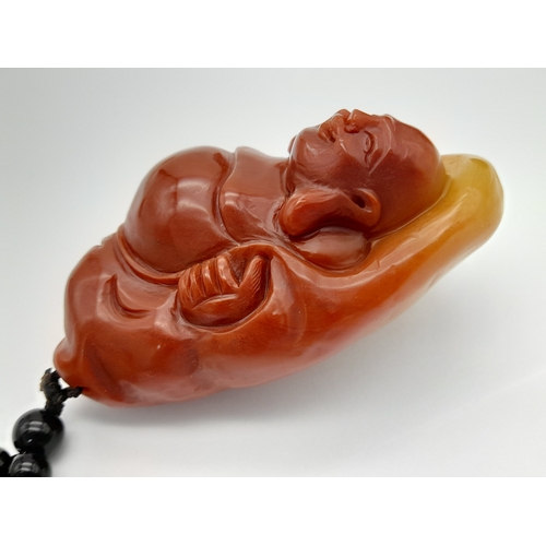 80 - A Shoushan stone pendant depicting the Buddha (Amitabha). Height 8 cm; Width 5 cm; Weight 146 g. The... 