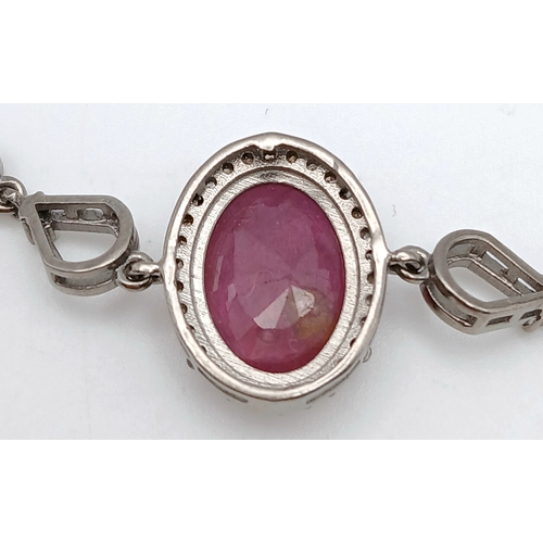 67 - An Oval Cut 8ct Ruby with Diamond Accents Set in 925 Silver bracelet. Adjustable. CD-2017.
