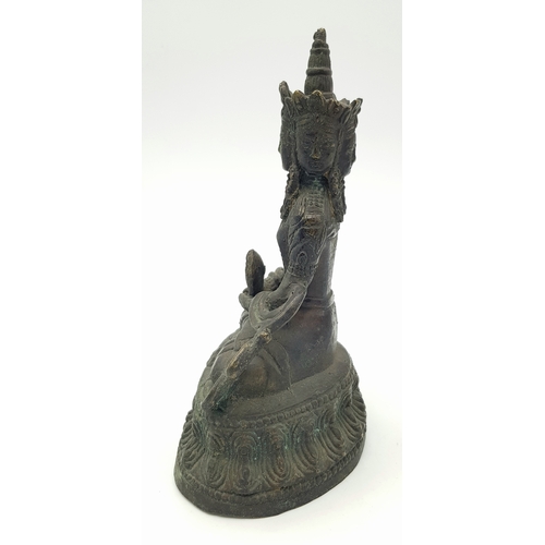 45 - A Seated Bronze Buddha: A finely cast bronze figure of the Buddha in dhyanasana (meditative posture)... 
