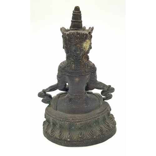 45 - A Seated Bronze Buddha: A finely cast bronze figure of the Buddha in dhyanasana (meditative posture)... 