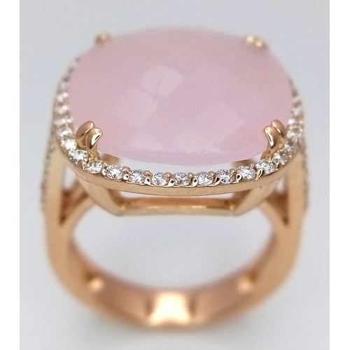 149 - An 18K White Gold, Pink Moonstone and Diamond Cocktail Ring. Cushion cut faceted c.12ct moonstone wi... 