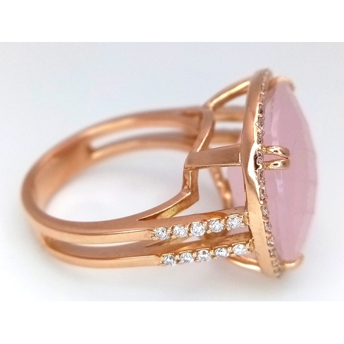 149 - An 18K White Gold, Pink Moonstone and Diamond Cocktail Ring. Cushion cut faceted c.12ct moonstone wi... 