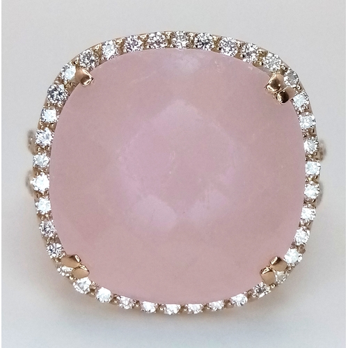 149 - An 18K White Gold, Pink Moonstone and Diamond Cocktail Ring. Cushion cut faceted c.12ct moonstone wi... 