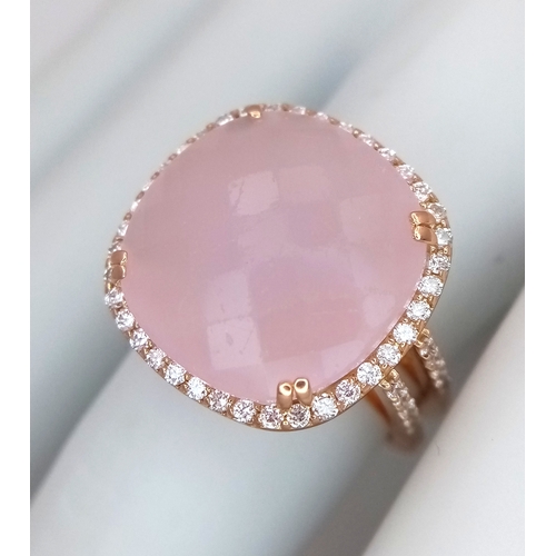 149 - An 18K White Gold, Pink Moonstone and Diamond Cocktail Ring. Cushion cut faceted c.12ct moonstone wi... 
