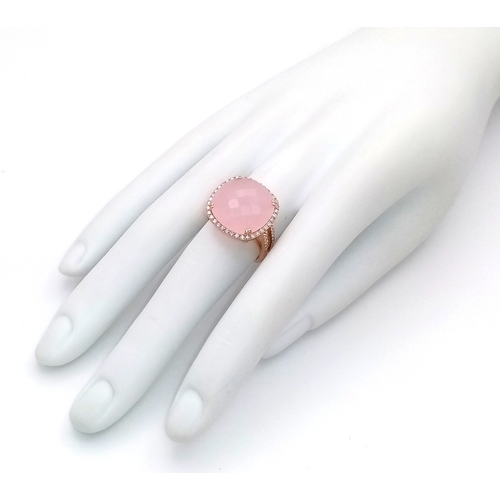 149 - An 18K White Gold, Pink Moonstone and Diamond Cocktail Ring. Cushion cut faceted c.12ct moonstone wi... 
