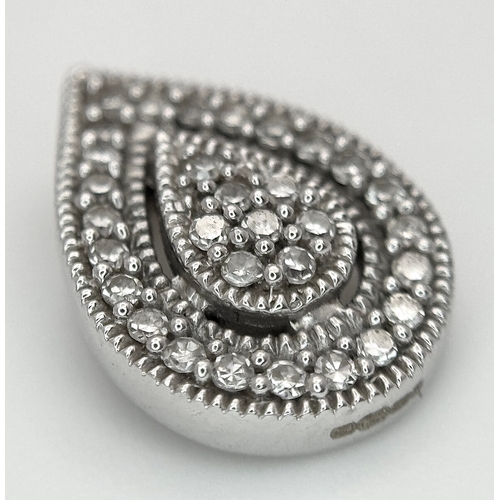 526 - A 9K White Gold, Diamond Pave Pair Shaped Pendant. 12mm. 
1.25g.