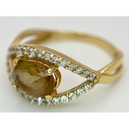 533 - A 14K Yellow Gold, Green stone (possibly tourmaline) and White Stone Ring in Eye Form. 1.75ct oval c... 