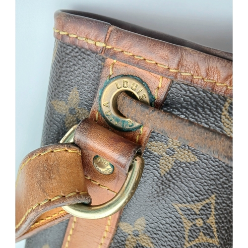 180 - A Louis Vuitton Brown Monogram Noé Shoulder Bag. Brown monogram coated canvas exterior with gold-ton... 