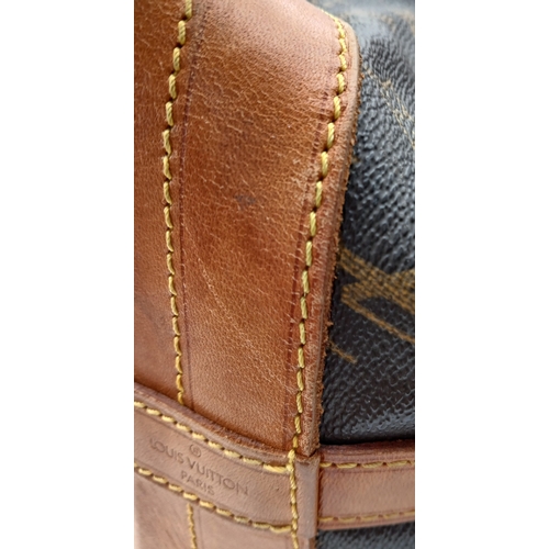 180 - A Louis Vuitton Brown Monogram Noé Shoulder Bag. Brown monogram coated canvas exterior with gold-ton... 