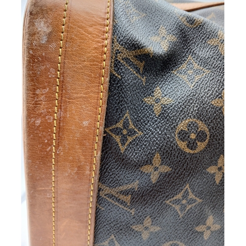 180 - A Louis Vuitton Brown Monogram Noé Shoulder Bag. Brown monogram coated canvas exterior with gold-ton... 