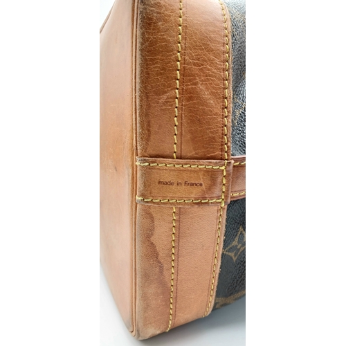 180 - A Louis Vuitton Brown Monogram Noé Shoulder Bag. Brown monogram coated canvas exterior with gold-ton... 