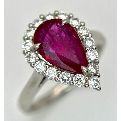 A W.G.I. Certified 950 Platinum, Ruby and Diamond Ladies Cocktail Ring. A 1.68ct Indochine Pear cut Ruby with a 0.52ctw diamond surround of H-I colour and VS2-SI1 clarity. 
Size M 1/2. 7.05g total weight. Ref: 13/13206.