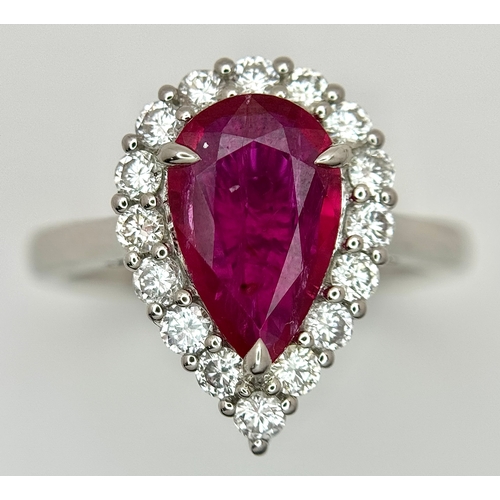 547 - A W.G.I. Certified 950 Platinum, Ruby and Diamond Ladies Cocktail Ring. A 1.68ct Indochine Pear cut ... 