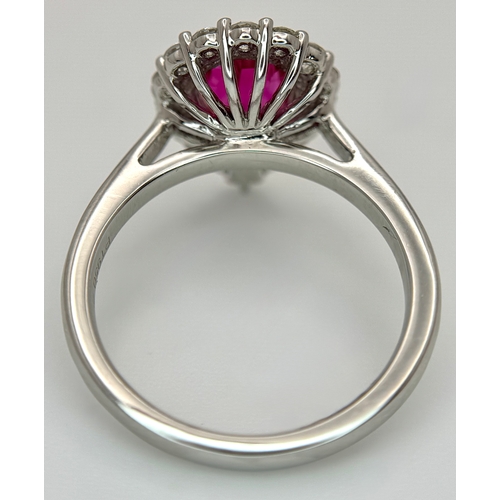 547 - A W.G.I. Certified 950 Platinum, Ruby and Diamond Ladies Cocktail Ring. A 1.68ct Indochine Pear cut ... 