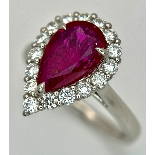 547 - A W.G.I. Certified 950 Platinum, Ruby and Diamond Ladies Cocktail Ring. A 1.68ct Indochine Pear cut ... 
