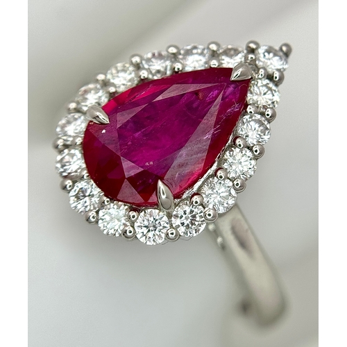 547 - A W.G.I. Certified 950 Platinum, Ruby and Diamond Ladies Cocktail Ring. A 1.68ct Indochine Pear cut ... 