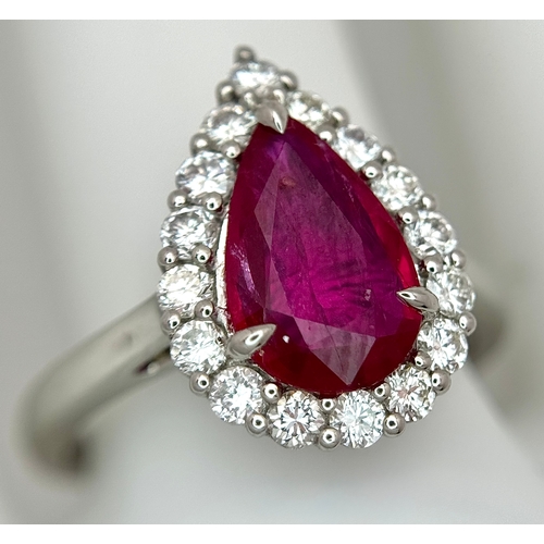 547 - A W.G.I. Certified 950 Platinum, Ruby and Diamond Ladies Cocktail Ring. A 1.68ct Indochine Pear cut ... 