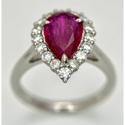 547 - A W.G.I. Certified 950 Platinum, Ruby and Diamond Ladies Cocktail Ring. A 1.68ct Indochine Pear cut ... 
