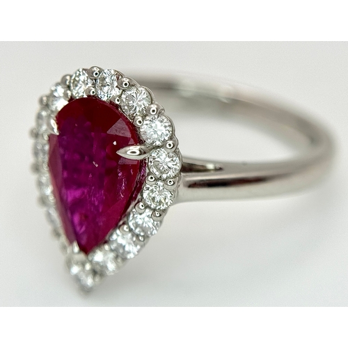 547 - A W.G.I. Certified 950 Platinum, Ruby and Diamond Ladies Cocktail Ring. A 1.68ct Indochine Pear cut ... 